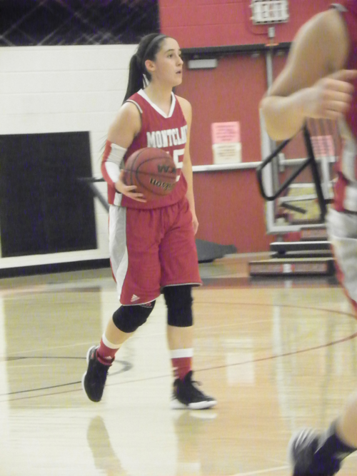 Photo by Jim HagueKearny’s Janitza Aquino is having a fi ne year as the starting point guard at Montclair State.
