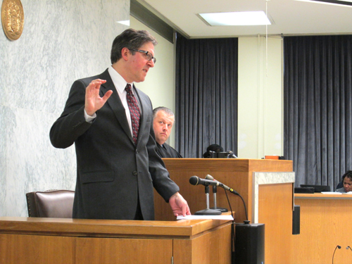 Photo by Ron LeirJudge John Young Jr. watches witness Dr. Peter Paul sworn in.