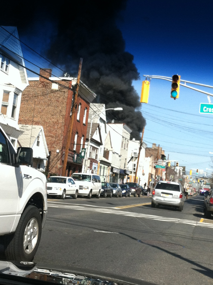 Photo courtesy Erin Fallon Smoke billows from scene of five-alarm fire in Harrison on Sunday.