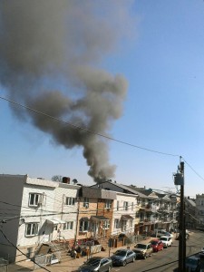 Photo By Alyssa Ficeto This photo was taken just moments ago from a few blocks away from the fire scene. Smoke continues to billow from the scene.