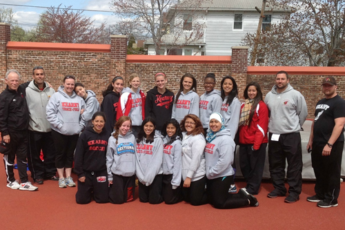 Members of the Kearny girls’ track and field team that won the Hudson County Interscholastic Athletic League Relay Championships get together on the track at the high school. Front row, from l., are Amber Crispin, Aislinn Sroczynski, Erika Alzamora, Bianca Torales, Maria Angulo and Omayma Saadani. Back row, from l., are assistant coach Jim Cifelli, assistant coach Vin Almeida, Mandie Lavelle, Wendy Carranza, Chelsea DaSilva, Mariah Davilla, Haley Durning, Anna Czykier, Justine Curtis, Noemi Campos, Lissette Villata, head coach Al Perez and assistant coach John Kryzanowski.