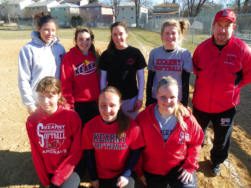 Photo by Jim Hague The Kearny High School softball team looks to be competitive once again this season. Front row, from l., are Kristen Stankus, Nicole Stankus and Jennifer Stankus. Back row, from l., are assistant coach Amy Goldman, Emily Papa, Kelsey French, Kerry Sweeney and head coach Jim Pickel.