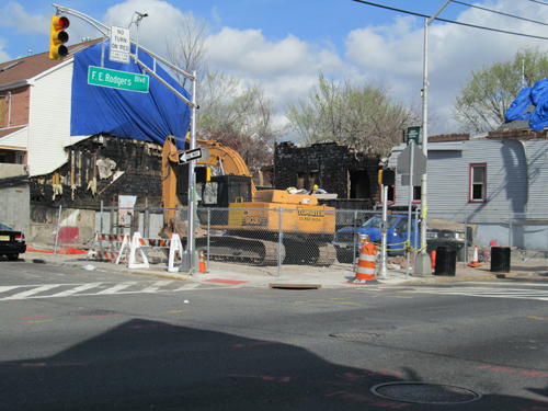 Photo by Ron Leir A demolition crew was still at work at the scene of the March 10 fire at Frank E. Rodgers Blvd. North and Davis St.