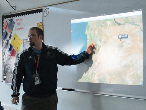 Photo by Ron Leir World History Honors teacher Patrick Newman projects a digital map image to review with his students.