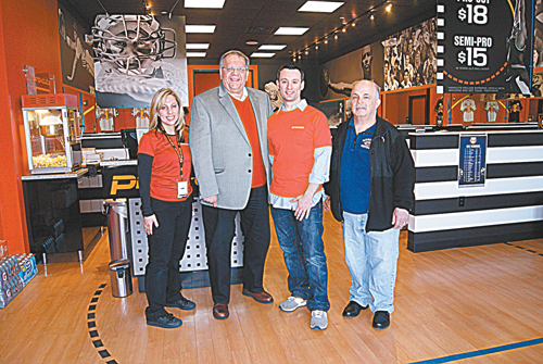 Photos by Karen Zautyk Harrison Mayor Ray McDonough and Councilman Larry Bennett with MaKara Maffei and Jim Cretella at grand opening