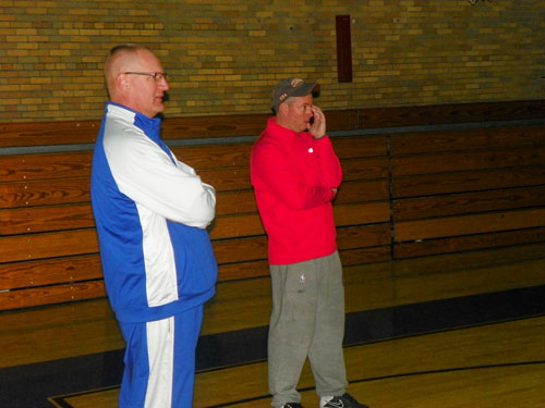 Photo by Jim Hague North Arlington coach Dave Walsh (l.) surveys a practice with New York Knicks radio analyst Brendan Brown, a longtime friend who came to an NA practice every year. Walsh announced his resignation last week after 10 years at NA.