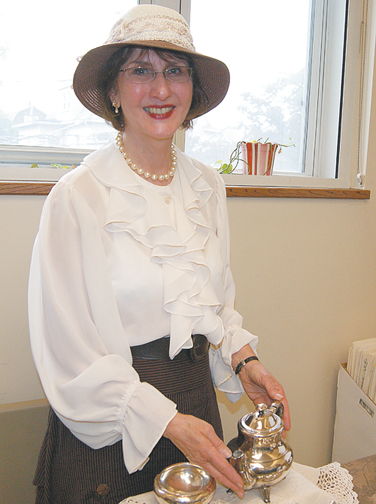 Photo by Karen Zautyk continued next page Judith Krall-Russo with basic necessities for a proper Edwardian tea