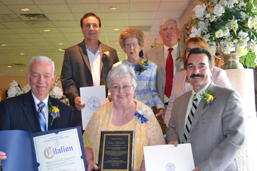 Photos courtesy of Hudson County government East Newark’s Eileen Schimenti with Mayor Joseph Smith (l.), Freeholder Chairman Anthony Romano (back l.) and County Executive Tom DeGise (back r.).