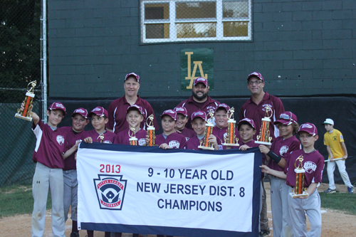 Photo courtesy of Dave Walsh The Nutley East 10-year-old All-Stars proudly display their trophies after winning the recent District 8 championship. From left are Joe Pezzino, Nick Polewka, Chase Nicolette, Justin Edert, John Coppola, Jake Walsh, Scott Christman, Billy Searle, Joe Senatore, Spencer Ojeda, Max Malanga. In the back from left are coaches Billy Edert, Dave Walsh and Dave Christman. Nick Palangio was missing from the picture