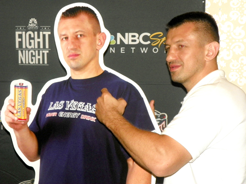 Photo by Jim Hague Kearny resident and top heavyweight contender Tomasz Adamek takes a shot at a cardboard cutout of himself at last week’s press conference promoting his upcoming fight Aug. 3 against Tony Grano at the Mohegan Sun.