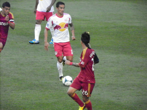 Photo by Jim Hague Red Bulls midfi elder Tim Cahill (17) moves through Real Salt Lake defenders Ned Grabavoy (l.) and Sebastian Velasquez (r.) during Saturday night’s 4-3 wild win for the Red Bulls.