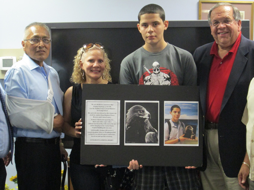 Photos by Ron Leir Harrison’s Josh Santiago displays his art project that captured first place in a Congressional art competition.