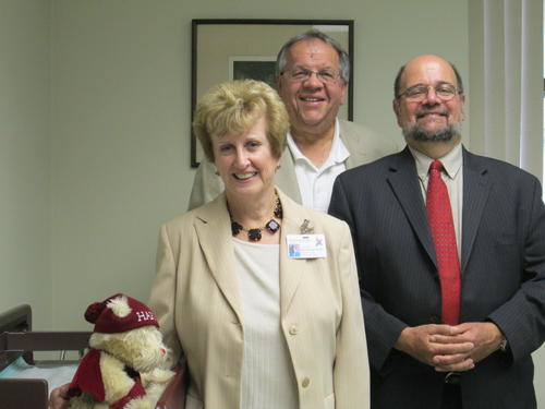 Photo by Ron Leir NHCAC leader Joan Quigley, Mayor Ray McDonough (c.) and NHCAC Director of Operations Vincent Yurgola inside the future Harrison Health Center.