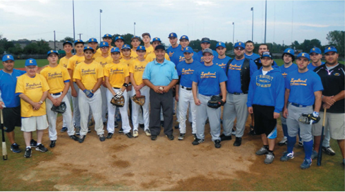 Photo by Jim Hague The 2013 Lyndhurst state champions (l.) took on the 2008 Lyndhurst state champs (r.) in a charity baseball game last week, with coach Butch Servideo (c.) serving as an umpire. The 2008 team won, 10-2.