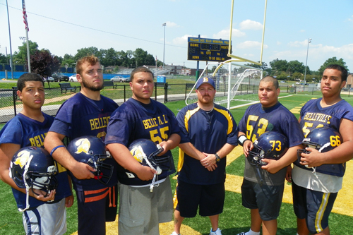 Photo by Jim Hague The Belleville High School football team will be much improved this season, if the offensive line has anything to say about it. From l. are Chris Figueroa, Nick Nardachone, head coach John Dubuque, Jose Gonzalez, Johnny Ramirez and Joshua Marte.