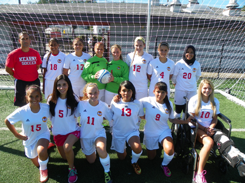 Photo by Jim Hague The Kearny girls’ soccer team will have almost a totally rebuilt defense this season. Front row from l. are Gisselle Blancas, Chelsea DaSilva, Lacey Burton, Ashley Castaneda, Alexis Castaneda and Amanda Eustice. Back row, from l., are Isabel Fernandez, Ryelle Seda, Amanda DeSousa, Laura Vilar, Dana Green, Eliza Rodrigues and Salma Bouzidi.
