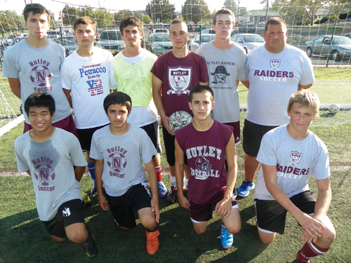 Photo by Jim Hague The Nutley boys’ soccer team will try to defend the SEC divisional title they won a year ago. Front row, from l., are Yoshio Ishikawa, Tommy Melillo, Anthony DeBlasio and Jack Contini. Back row, from left, are Nick Feraco, Domenic Palumbo, Santino Gabriele, Joseph Nichols, Will Montgomery and head coach Marcellino Marra.