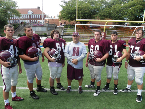 Photo by Jim Hague The Nutley football team will look to improve with the work of their front line. From l. are Gabriel Tortora, Randy Rauco, Jesse Defuria, head coach Tom Basile, Brian Devine, Mike Buckley and Chris Palma