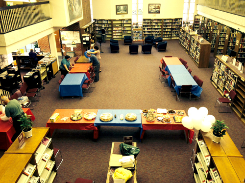 Photos by Anthony Coelho Adele Puccio takes stock of her new surroundings at Bloomfield Public Library.