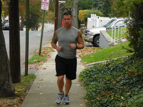 Photo by Jim Hague Kearny firefighter Doug Boyle trains near his home in Kearny, preparing for the New York City Marathon.