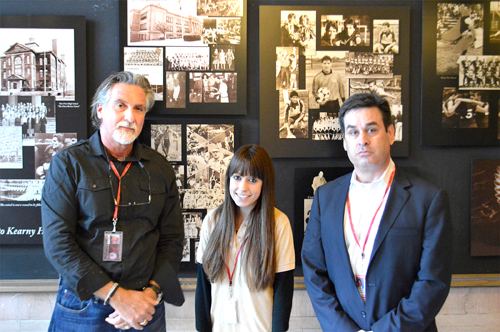 Photo by Jack Grimm Teacher Gary DiVincenzo (l.), senior Shannon Stoia and Principal Al Gilson and the newly decorated photo wall.