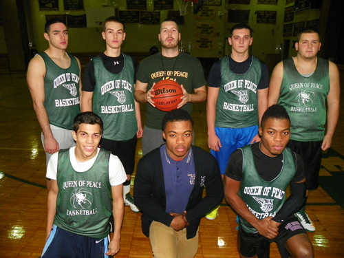 Photo by Jim Hague The Golden Griffins of Queen of Peace will be a much better team this year. Front row, from l. are Kristian Rosario, Kevin Momnohin and Keith Momnohin. Back row, from left, are Danny Douelfakar, Matt Riley, head coach Tom McGuire, Pat O’Keeffe and Anthony Burgagni