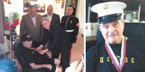 Photo courtesy Photos courtesy Courtney Johnson U.S. Marine veteran Pasquale Turello displays medal, which he accepted at his home from Commissioner Steven Rogers and guests. From l., Turello (seated) with Rogers, Berkeley Mayor Carmen F. Amato, Berkeley Council President James J. Burns, and U.S. Marine Cpl. Carlos M. Hernandez.