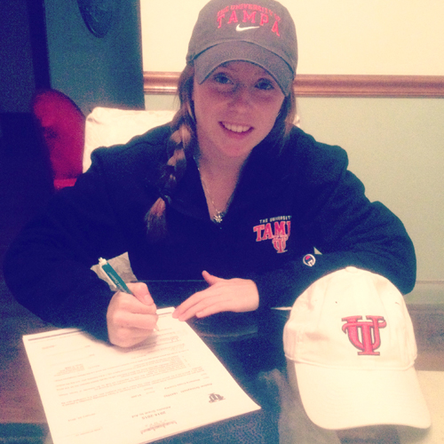 Photo courtesy the Sroczynski family Kearny High School senior Aislinn Sroczynski is all smiles after signing her national letter of intent to attend the University of Tampa on a track scholarship.