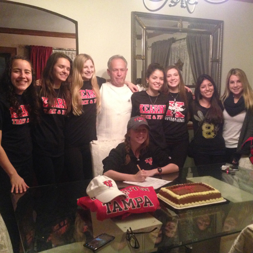 Photo courtesy the Sroczynski family The entire Kearny girls’ track team with coach Jim Cifelli (center) celebrates Aislinn Sroczynski signing a national letter of intent to attend the University of Tampa.