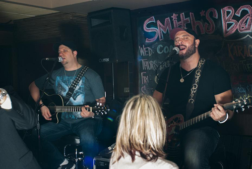 Photo courtesy Wayne Bilotti Andre Lahr (l.) and Wayne Bilotti at a recent C.O.A.L.G. gig. The duo’s stage name is a shorthand combination of previous band names.