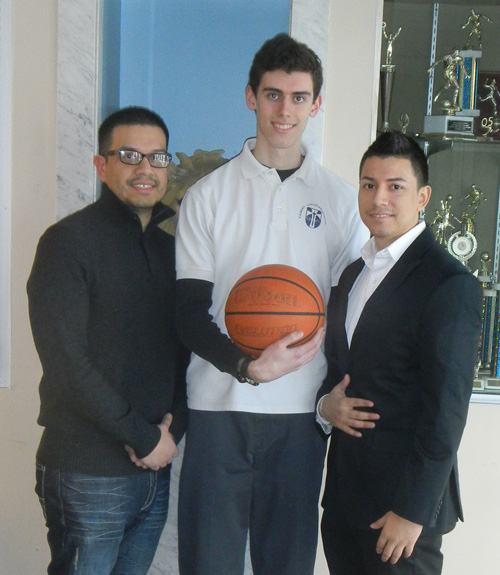 Picture courtesy of David J. Friere Kearny Christian Academy senior John Bianoski (c.) owned the highest scoring average in local boys’ high school basketball, scoring 25 points per game this season. Flanking Bianoski are coaching brothers Ariel Friere (l.), the head coach, and assistant coach David J. Friere.