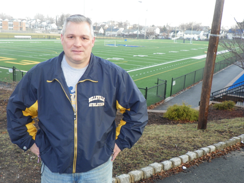 Photo by Jim Hague Joe Fischer stands above Doc Ellis Field in Belleville, where he will be on the sidelines again as the Belleville High School head football coach. Fischer coached the Buccaneers for four seasons from 2004 through 2007 and was appointed recently as the Bucs’ head coach for 2014.