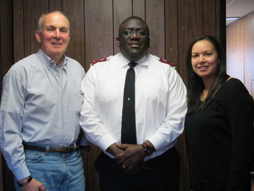 Photo by Ron Leir Salvation Army Lt. Maurice Moukouangala (c.) with honorees Paul Rogers and Alexis Capik of Spectra Colors.