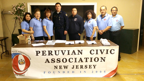 Photo courtesy Ana Placencia
Members of the Peruvian Civic Association with KFD Chief Inspector John Donovan and Firefighter Juan Barroso.