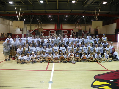 Photo by Jim Hague The entire group of young ladies who participated in the Kearny High School girls’ basketball camp pose with head coach and head instructor Jody Hill (c.).