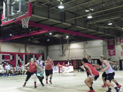 Photo by Jim Hague Harrison and Kearny locked horns last week in the summer league that has been a godsend for several local teams.