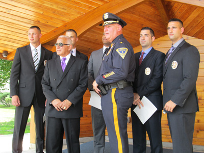 Photos by Ron Leir After getting their badges, they pose for family and friends with the mayor and Chief James O’Connor.