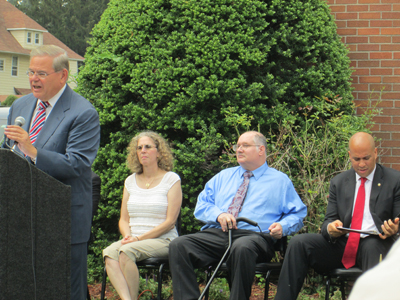 Photos by Ron Leir From l. are Sen. Robert Menendez, Sandy Reilly, her brother Gary Schall , a disabled veteran; and Sen. Cory Booker.
