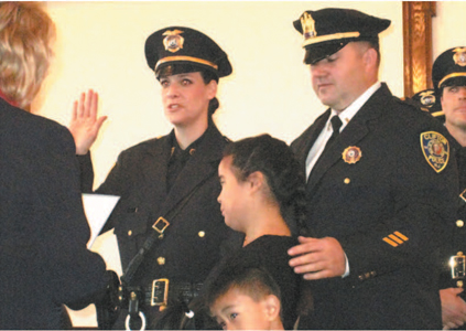 Sgt. Donna Niland is one of seven Lyndhurst cops promoted, about a month after Mayor Robert Giangeruso is shifted, from public safety director to public affairs director.
